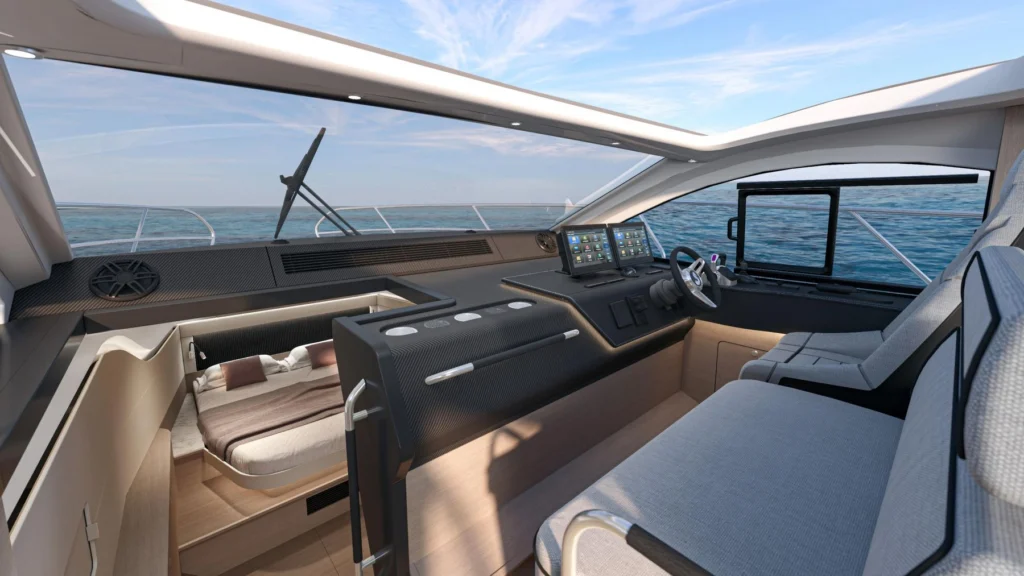 Wheelhouse of the Bénéteau Gran Turismo 40 with open roof and helm screens