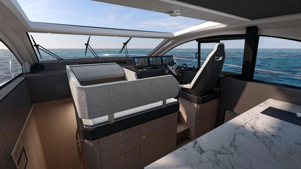 Wheelhouse of the Bénéteau Gran Turismo 50 with galley and helm