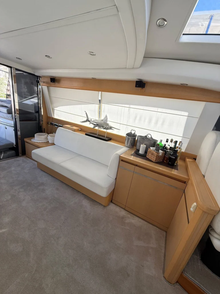 Saloon sofa and bar aft on the Princess V70